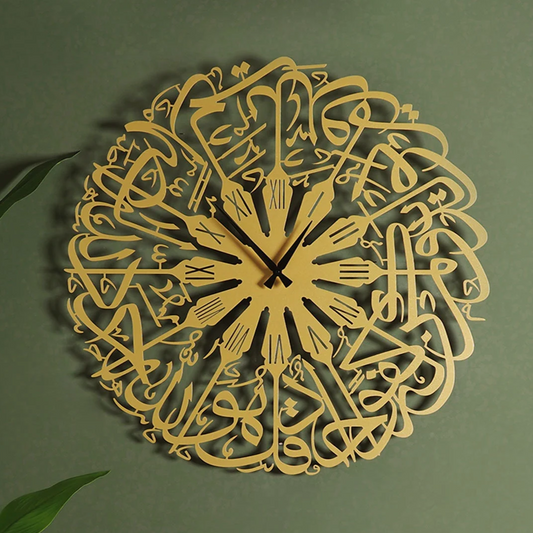 Decorative wall clock with Arabic calligraphy on a green wall